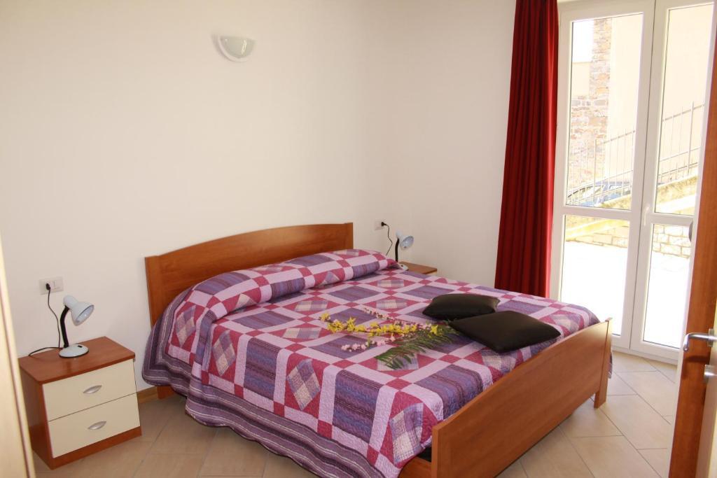 Residence Le Azalee & Spa Vercana Pokoj fotografie